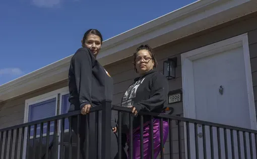 Veronica, left, and Aleina, seen here outside their apartment on April 6, 2026, are in the intensive outpatient program at Recovering Hope, an addiction treatment center in Mora, Minn. Veronica has a young child she hopes to get back soon after finishing her treatment. Credit: Ellen Schmidt/MinnPost/CatchLight Local/Report for America