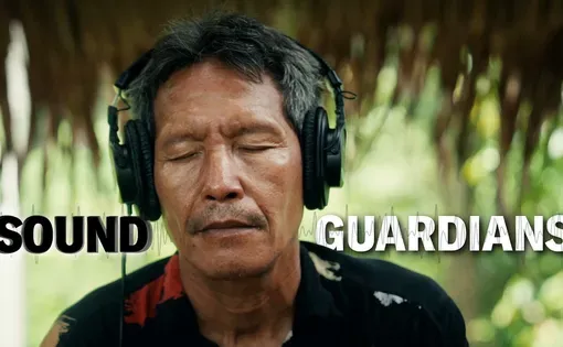 a man listens to headphones