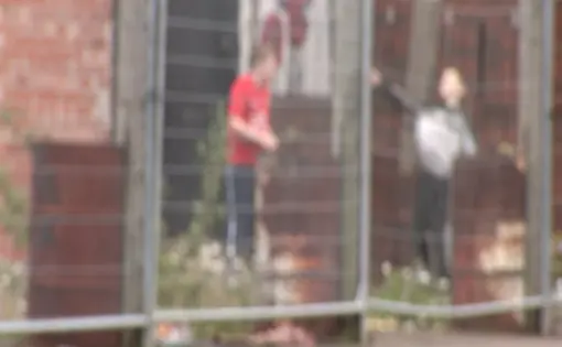 Rock throwing. Image by Scott P. Harris, Northern Ireland, 2009.