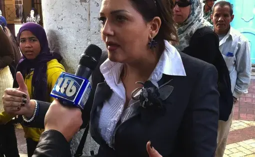 Candidate Gamila Ismail at polling station on Kasr Al Aini St. Egypt, 2011.