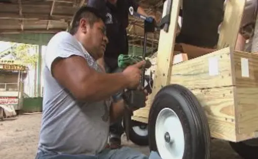 Isaias Vasquez, who has struggled with polio his whole life, works in the Hope Haven wheelchair factory. Image by Alex Rozier, Guatemala, 2010.