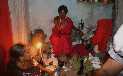 Fatuma among her devotees. Image by Mary Wiltenburg. Tanzania, 2011.