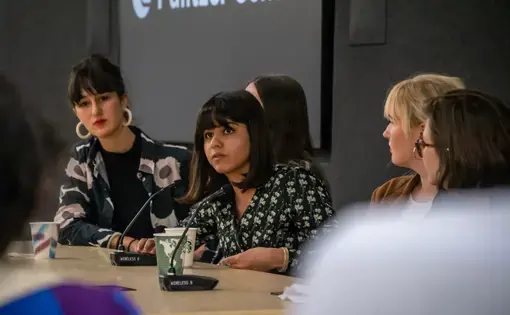 Pallavi Puri from Boston University School of Public Health answers a panel question on her reporting on beedi rollers in India. Image by Nora Moraga-Lewy. United States, 2019.