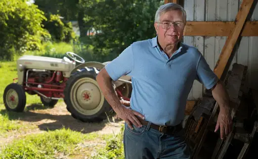 Pete Hardin, editor and publisher of the dairy trade publication The Milkweed at his home in Brooklyn, Wisconsin. Image by Mark Hoffman. United States, 2019.