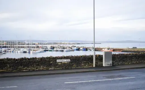 Cromwell Road, near the Kirkwall Marina. Kirkwall is one of the two main cities on the Orkney mainland. Like Stromness, the other city, Kirkwall is a harbor town. Image by Maggie More. United Kingdom, 2020.