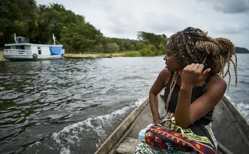 Drica on her way to the community school where she's a teacher. Image by Pablo Albarenga.&nbsp;Brazil, 2019.&nbsp;
