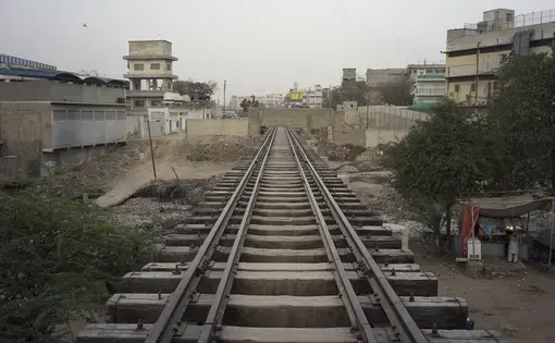 Wall Across Trestle Bridge, Orange Town Station, Karachi, Pakistan. Image from KCR, by Ivan Sigal. Pakistan, 2014-2017.