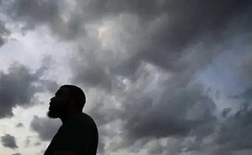 Arthur Gilliam, 37, of East Baltimore says he is $40,000 in child support debt, some of which accumulated while he was incarcerated. Image by Lloyd Fox / Baltimore Sun. United States, undated.