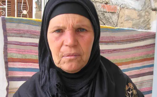 Mohammed Bouazizi's mother. Image by Ellen Knickmeyer. Tunisia, 2011.