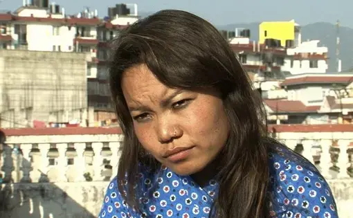 Bhawana Tamang on the roof-top of the shelter home where she now lives. Tamang was trafficked to India at the age of 12. She completed the training program at Shakti Samuha as a beautician. Image by Habiba Nosheen. Nepal, 2011.