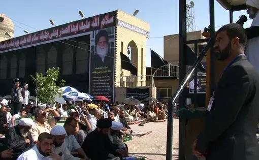 Friday prayers in Sadr City. Image by David Enders. Iraq, 2011.