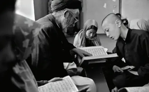 A madrasa (Islamic school) for Hazara children, Kabul. Image by Monika Bulaj. Afghanistan, 2019.