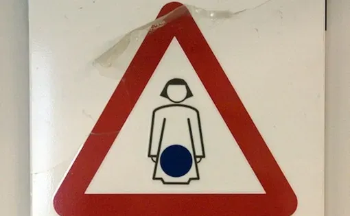 Picture of a signing warning pregnant women of possible exposure to radiation at the main government hospital in Nicosia, Cyprus.