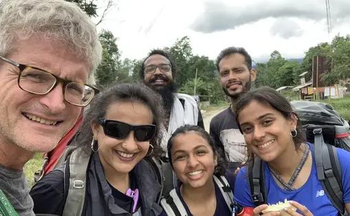 Salopek, left, poses with his Indian walking partners Arati Kumar-Rao, second from left, and, back row, Siddharth Agarwal and Hormazd Mehta, join with two young hikers near Imphal, India, as they neared the Myanmar border. Image by Paul Salopek. India, 2019.
