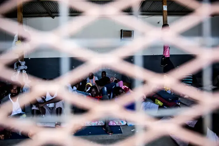 Migrants from West Africa in their crowded living quarters in the Abu Salim detention center in Tripoli. Image by Peter Tinti. Libya, 2017