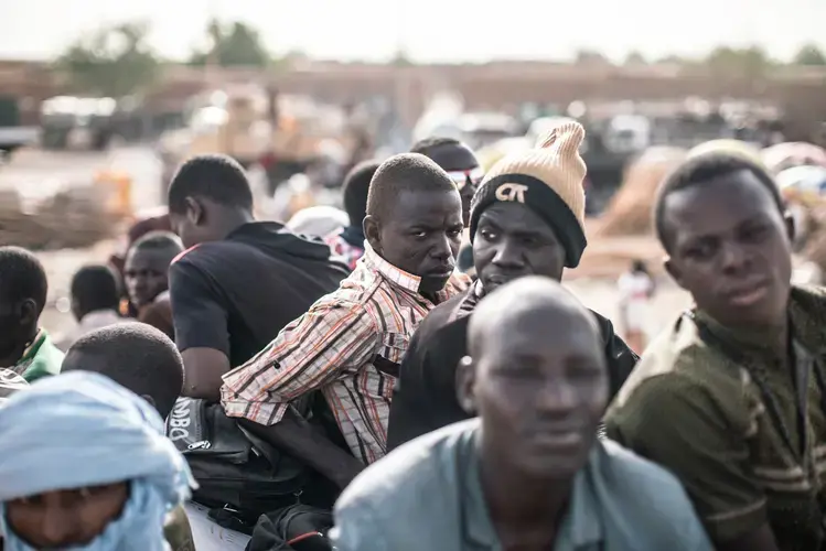 Migrant laborers on board a truck bound for the gold mines in Niger’s far north. Image by Nichole Sobecki. Niger, 2017.