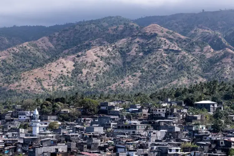 Deforested hillsides on Anjouan. Across the Comoros, deforestation has been rapid in the decades since independence from France. Image by Tommy Trenchard for The New York Times. Comoros, 2019.