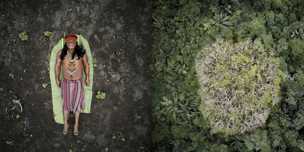 José juxtaposed with the Achuar rainforest in Ecuador. Image by Pablo Albarenga. Ecuador, 2019.