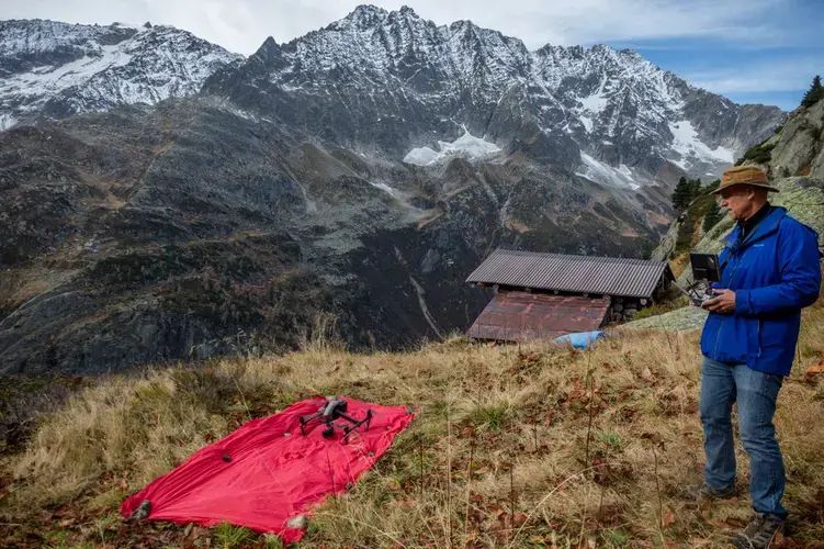 Mr. Steinmetz in a makeshift drone takeoff area in Switzerland, Oct. 2017. Image Courtesy of George Steinmetz. Switzerland, 2017.