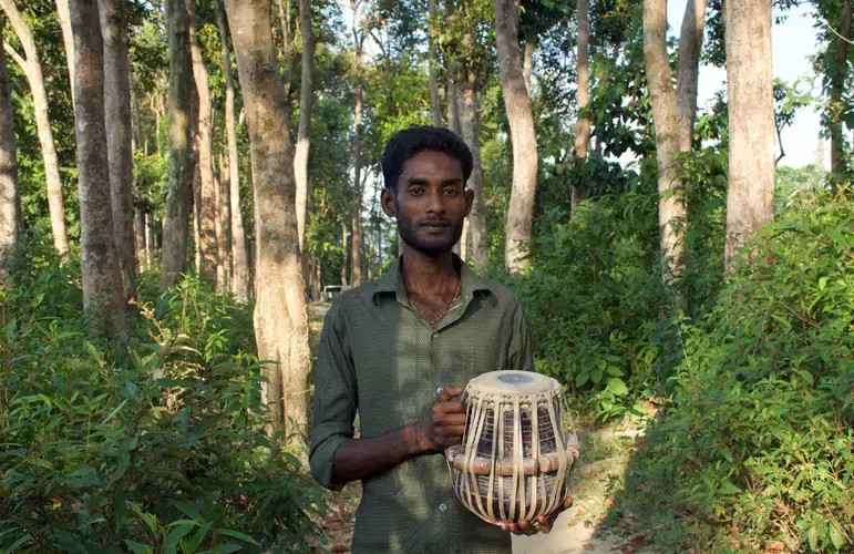 Sayed learned to play the tabla drums on St. Martin's Island, a vacation destination in Bangladesh. Image courtesy Music in Exile. Bangladesh, 2019.