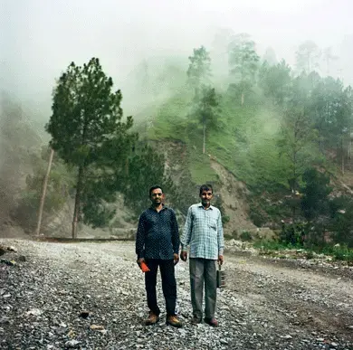 Construction workers from a nearby village walking to the Chenab Bridge site. Image by Sara Hylton. Kashmir, 2017.<br />
