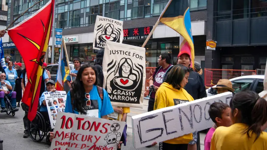 Grassy Narrows youth gather together at the front of the march as they wait for their elders and supporters to catch up. Canada, 2019. Image by Shelby Gilson.