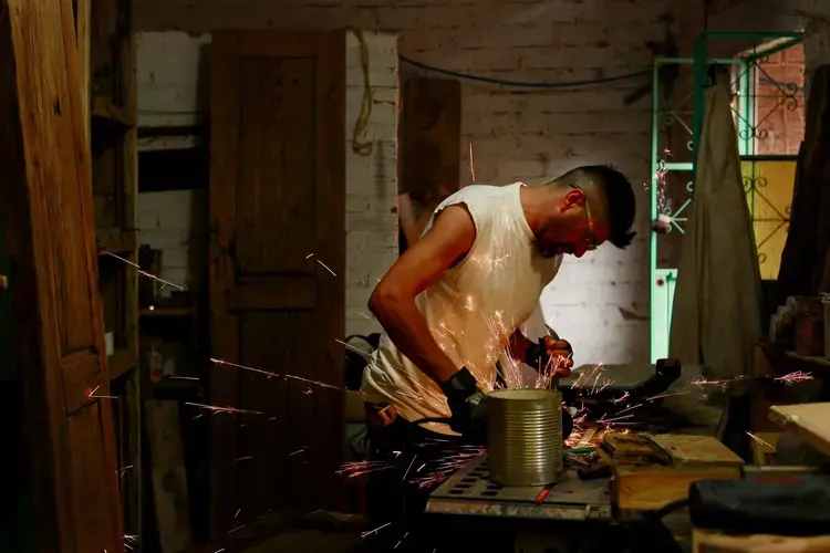 Rafael works in his carpentry shop. Image by Erika Schultz. Mexico, 2019. 