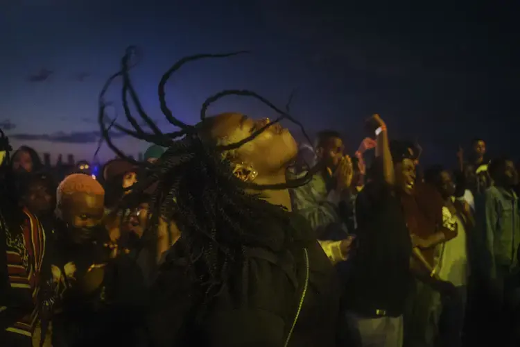 A music fan dances in a mosh pit at the African debut event of the Afropunk music festival hosted at Constitution Hill in Johannesburg. Image by Melissa Bunni Elian. South Africa, 2017.