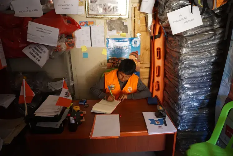 Jorge Almarchaz Paulino in his office. Image by Audrey Fromson. Peru, 2019.