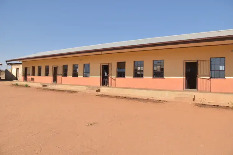 Utjane was built during the apartheid era in South Africa. Some buildings, like the one pictured here, are built entirely from mud and have not changed since they were first built in the 1970s. Image by Adam Yates. South Africa, 2018.