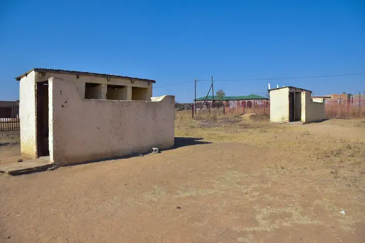 The new pit latrines at Utjane are safer than the original toilets, but still pose a serious threat to student safety. Image by Adam Yates. South Africa, 2018.