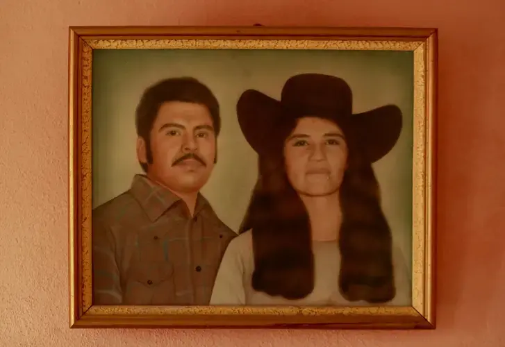 A portrait of Rafael’s parents is displayed in his home in Zacatecas. Image by Erika Schultz. Mexico, 2019.