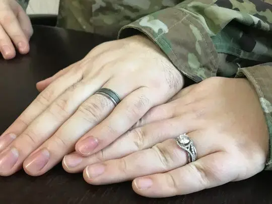 Wisconsin National Guard 1st Lieutenants Anna and Brian Kastelic are the only married couple deployed to Ukraine with a unit of 164 soldiers helping mentor Ukrainian military trainers. They met in the Guard and married in 2016. Image by Meg Jones / Milwaukee Journal Sentinel. Ukraine, 2020.