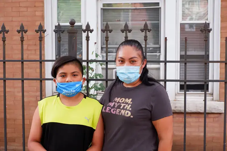 Nury Ortega and her son Alexander in Little Village. Image by Elena Bruess. United States, 2020.