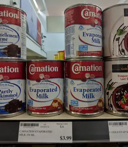 “I don’t even buy carnation milk, it’s not my thing. I see it a lot. Growing up, I see kids having carnation milk for formula,” says a mother of six from Iqaluit, Nunavut. Image by Julie De Meulemeester. Canada, 2018.