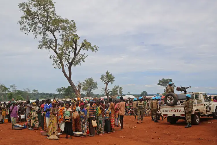 Displaced people wait for rations in Bria, Central African Republic, on Sept. 26. Image by Cassandra Vinograd. Central African Republic, 2017.