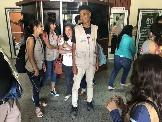 “In the past five years, I know a lot of young people who have migrated to the United States,” says Evans Paz (center), 18. Image by Jaime Joyce/TIME for Kids. Honduras, 2019.