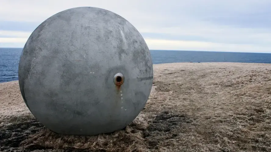 The sphere is about nine feet wide and weighs eight tons — making it heavy enough to withstand Grímsey’s winds. Image by Amy Martin. Iceland, 2018.