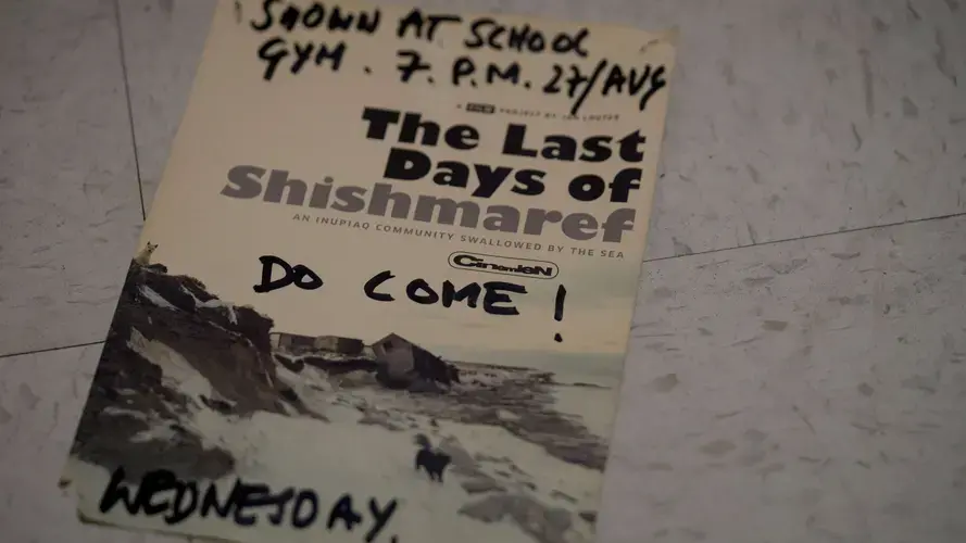A flyer invites residents to a screening of 'The Last Days of Shishmaref.' Someone has added a handwritten 'Do Come!' to the flyer. Image courtesy of Nick Mott. United States, 2018.