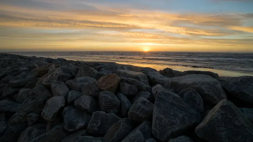 A midnight sunset over the seawall in Shishmaref. Image courtesy of Nick Mott. United States, 2018.