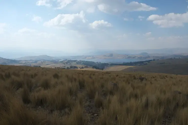 A state reservoir seen below that provides water to the entire basin of Ayacucho. Image by Dan Schwartz. Peru, 2019.<br />
