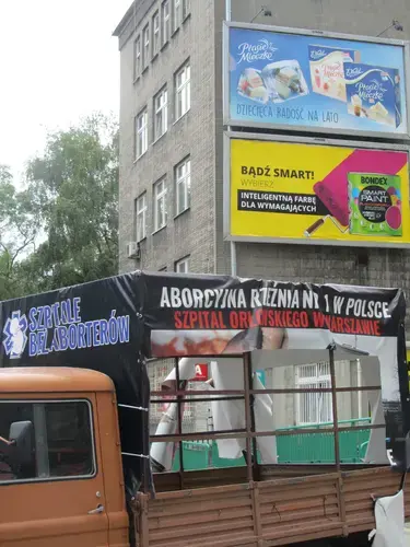 A defaced truck bearing anti-abortion messages outside one of the last hospitals in Poland that still performs abortions. Image by Alex Cocotas. Poland, 2016.
