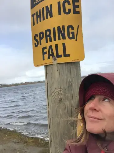 Amy Martin takes a selfie in Utqiagvik, Alaska, where she researched the impact of rising temperatures in the Arctic. Image by Amy Martin. Alaska, 2018.