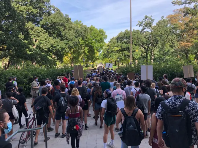 University of Chicago students and community members march across the quad in August calling for the abolition of UCPD, the University's private police force. Image courtesy of #CareNotCops. United States, 2020.