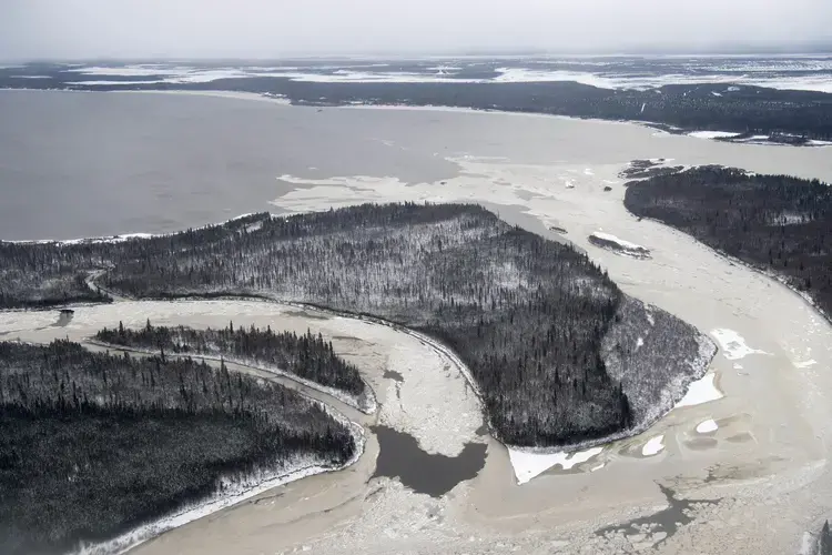 The waters from the Churchill River converge with the water from Lake Melville near Happy Valley-Goose Bay, Labrador on November 9, 2019. Image by Michael G. Seamans. Canada, 2019.