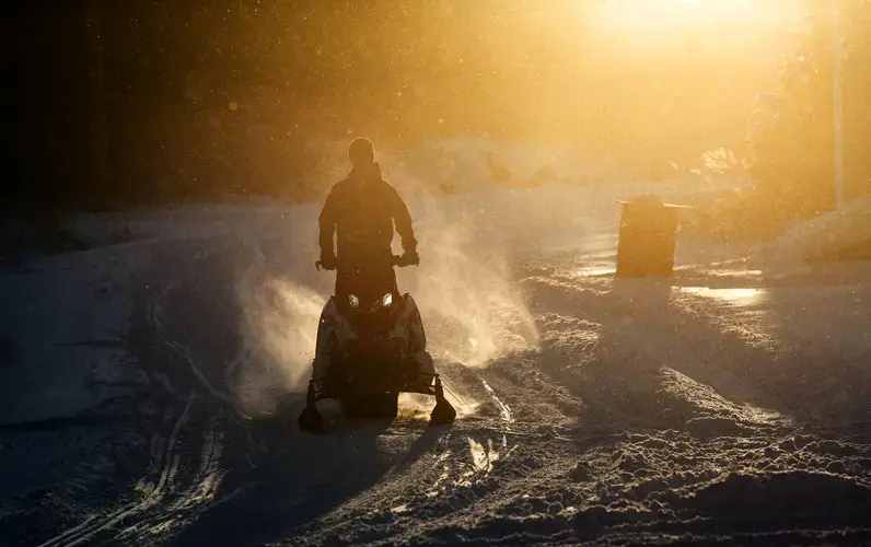 A high school student commutes home from a day at Northern Lights Academy in Rigolet. Labrador on November 14, 2019. Image by Michael G. Seamans. Canada, 2019.