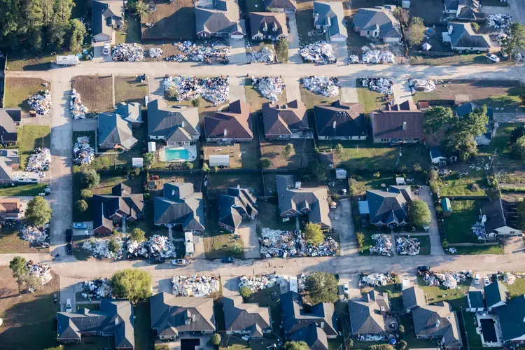 Water flowed into every house in this neighborhood of Vidor—five miles east of Beaumont—when the Neches River overflowed its banks. Image by Alex MacLean. United States, 2017.