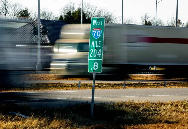 St. Charles County police look for suspicious vehicles along Interstate 70. Image by Brian Munoz. United States, 2019.