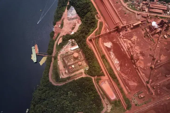 Aerial view of the mine on the Trombetas river. Image by Pablo Albarenga. Brazil, 2019.