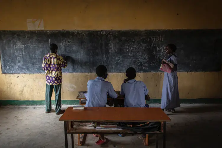Edward Lekapana, left, teaches at a school in Laisamis, Kenya. “Some come back. They don’t concentrate the way they were concentrating before. There are some who are married off. Those who are do not return to school after they're married,” he said. Image by Will Swanson. Kenya, 2020.
